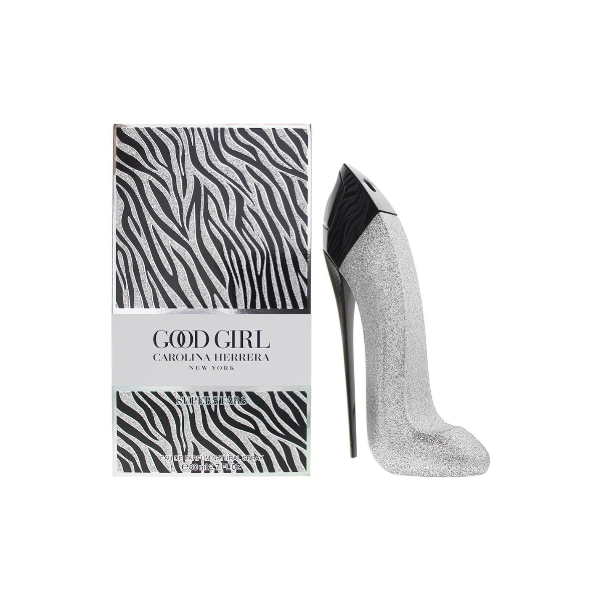 Silver high-heeled shoe next to a zebra-patterned Carolina Herrera 'Good Girl' perfume box on a white background