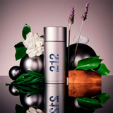 Perfume bottle labeled '212' with flowers and decorative elements on a reflective surface.