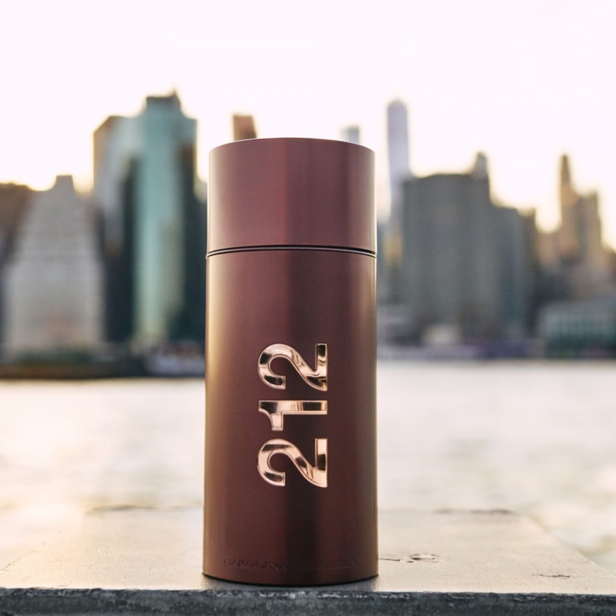 Brown cylindrical container with '242' branding against a cityscape background