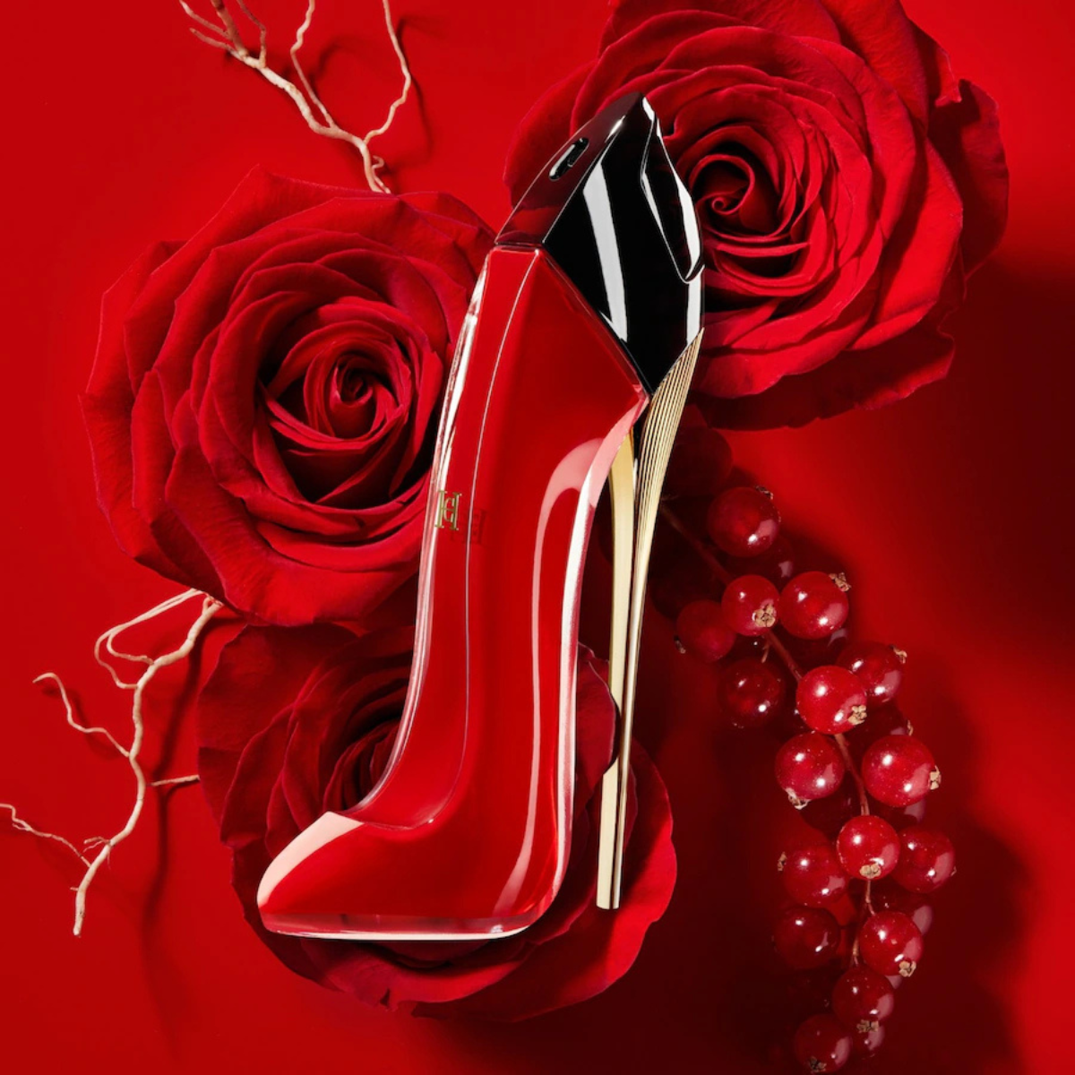 Red high-heeled shoe with gold accents on a red background with roses and berries