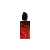 Red Giorgio Armani perfume bottle on a white background