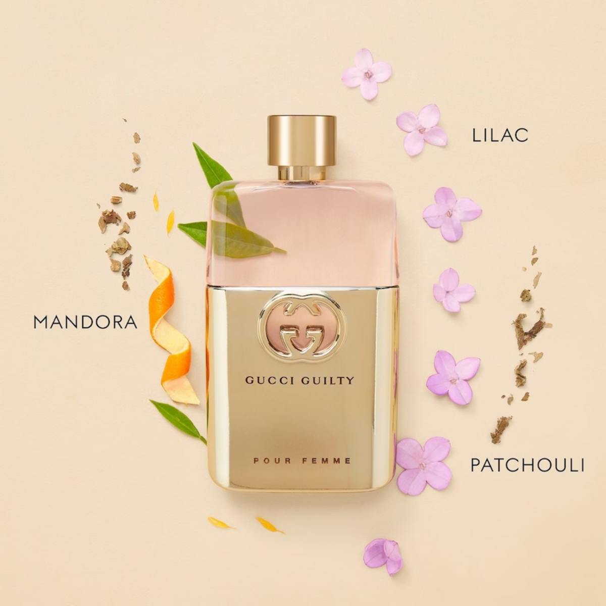 Gucci Guilty Pour Femme perfume bottle with floral and botanical elements on a beige background