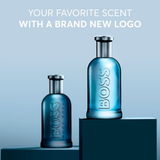 Two blue bottles of BOSS perfume on a blue background with text about a new logo.