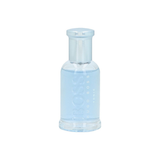 Clear bottle with blue liquid on a white background