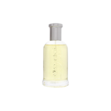 Perfume bottle with a silver cap on a white background
