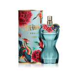 Perfume bottle and packaging with floral design on a white background