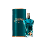 Blue perfume bottle and packaging with 'Jean Paul Gaultier' branding on a white background
