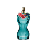 Blue perfume bottle with floral design on a white background